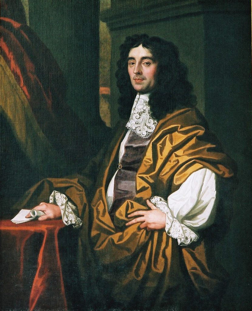 Portrait of Sir Joseph Williamson made in oils, by Sir Peter Lely and his studio. It is a two-thirds portrait and shows Williamson in a three-quarter pose, one hand resting on his hip and the other resting on a table draped in red fabric. The hand on the table holds a sheaf of papers. The fabrics Williamson wears and the drapery wrapped around him indicate a taste for luxurious goods.